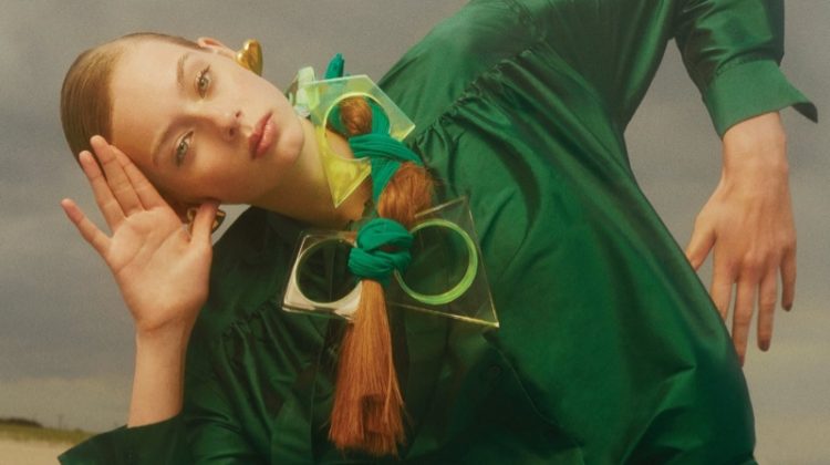 Wearing green, Lauren de Graaf models Ashish top and trousers