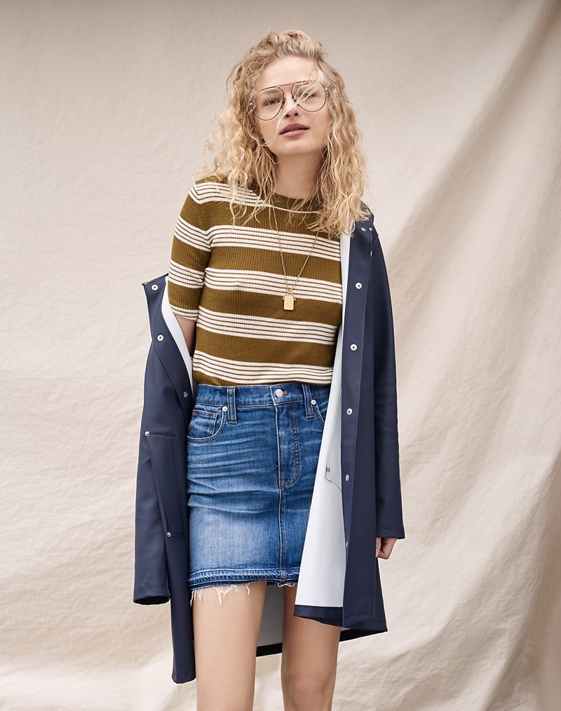 Stutterheim Mosebacke Raincoat, Madewell Ribbed Sweater Top in Bennett Stripe and Step-Hem Jean Skirt in Brandt Wash