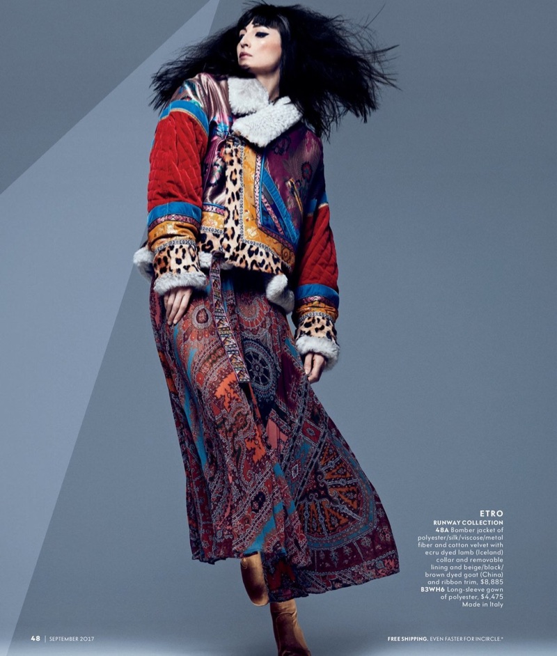 Erin O'Connor wears Etro bomber jacket and long sleeve gown