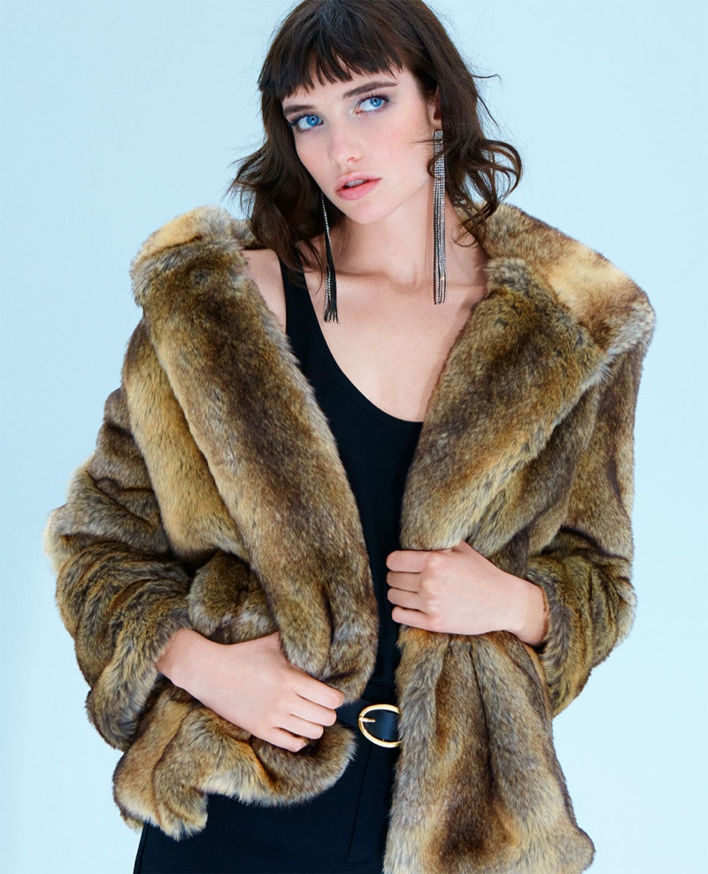 Zara faux fur coat with hood, strappy top, tuxedo trousers and rhinestone fringe earrings