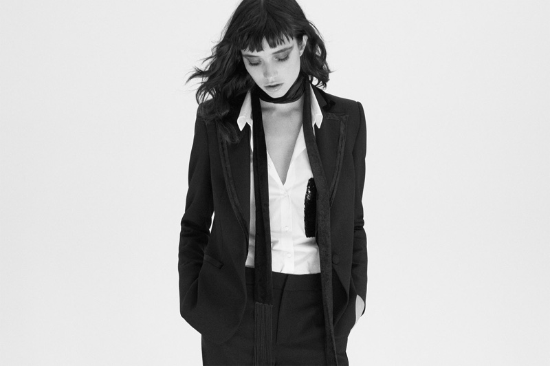 Grace Hartzel poses in Zara tuxedo collar blazer, shirt with sequined pocket, tuxedo trousers and fringed velvet scarf