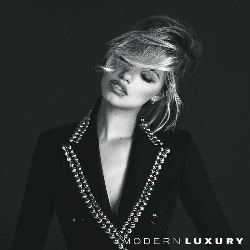 Hailey Clauson wears John Galliano blazer with Anita Ko earrings