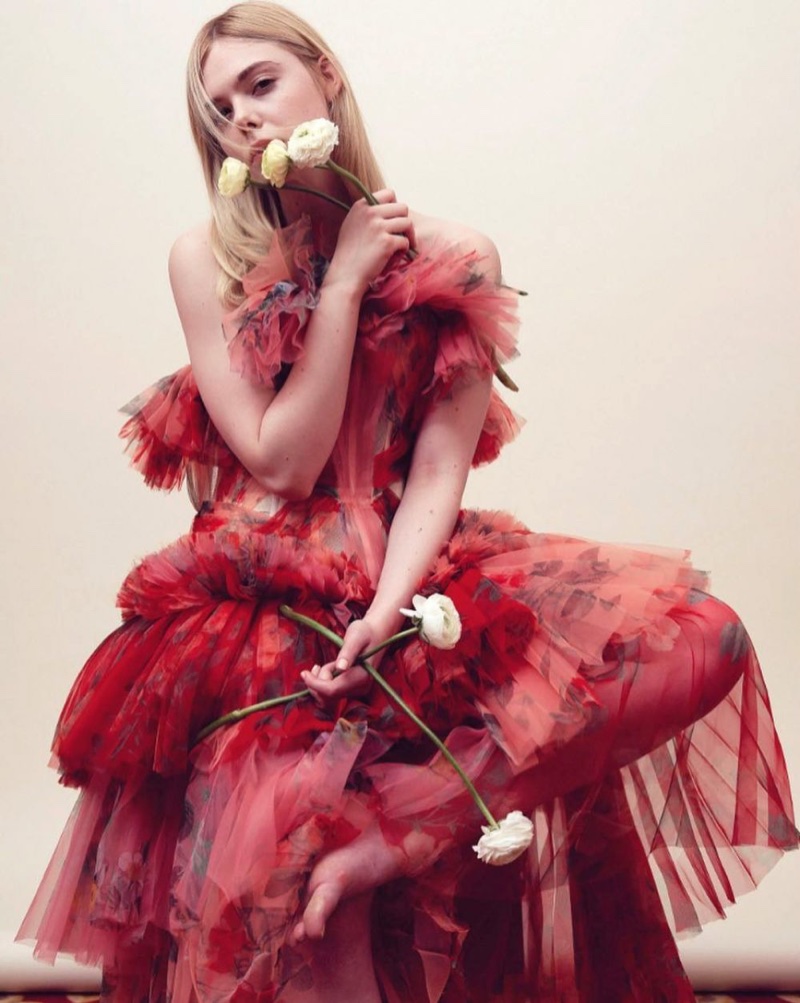 Dressed in red, Elle Fanning wears Alexander McQueen gown