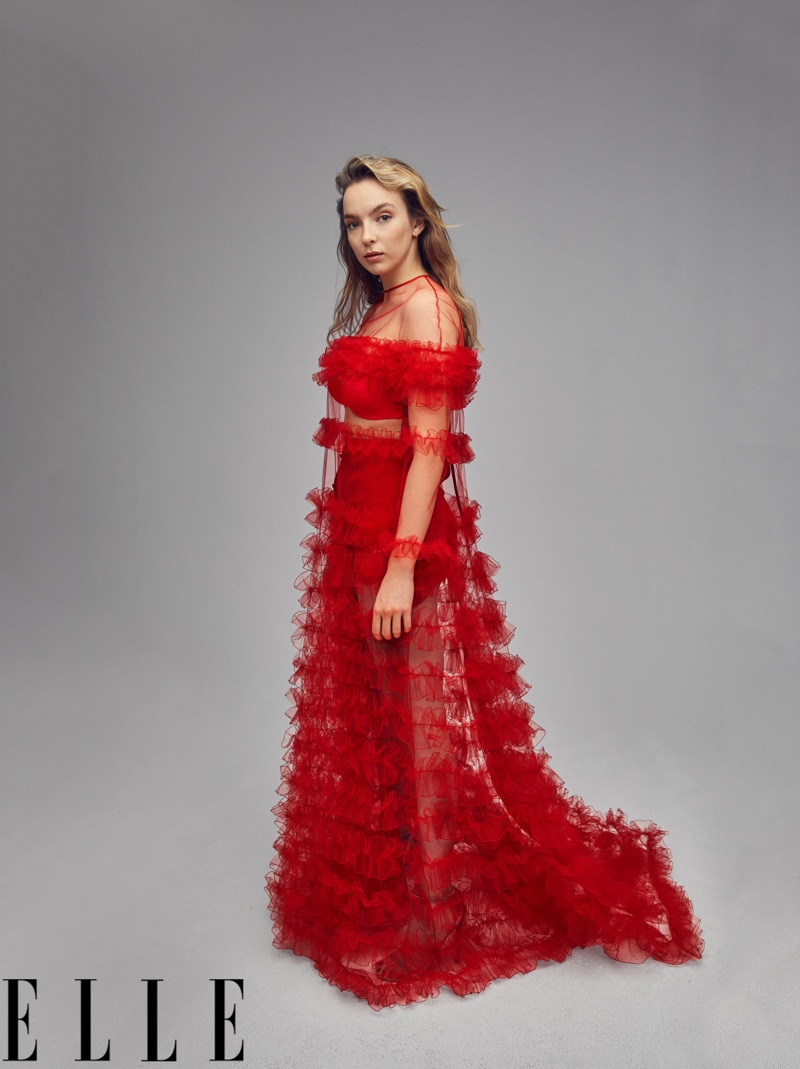 Jodie Comer wears red Valentino gown and shorts with Jimmy Choo sandals