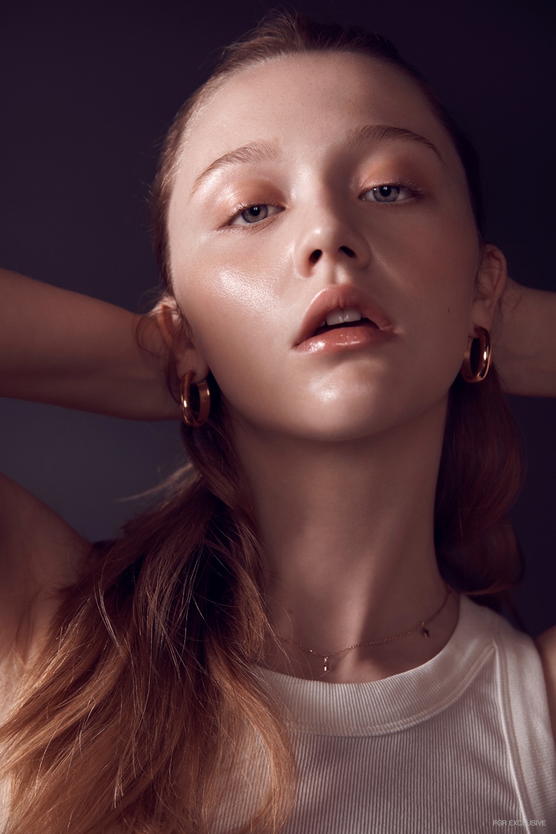 Charlotte wears COS Tank Top & stylist's own Earrings. Photo: Milos Mlynarik