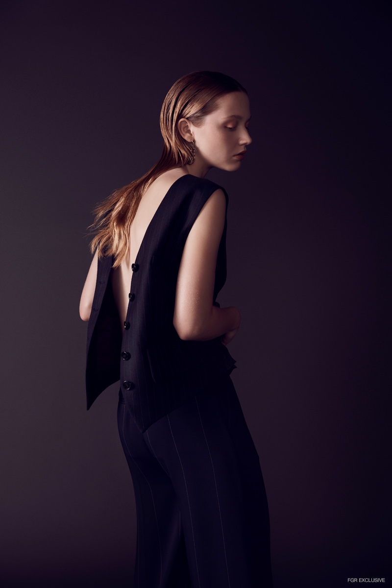 Charlotte wears Acne Studios Waistcoat, Camilla and Marc Trousers & Zimmermann Earrings. Photo: Milos Mlynarik