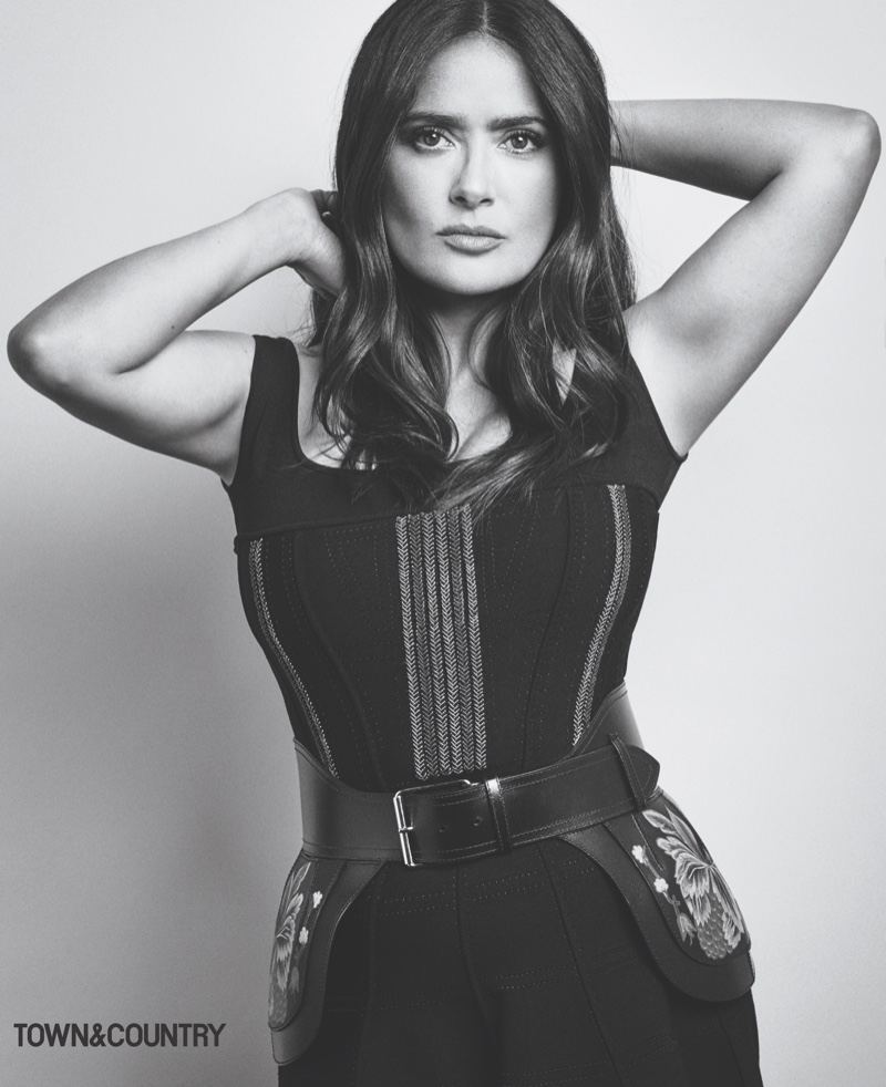 Actress Salma Hayek poses in Alexander McQueen corset dress and belt