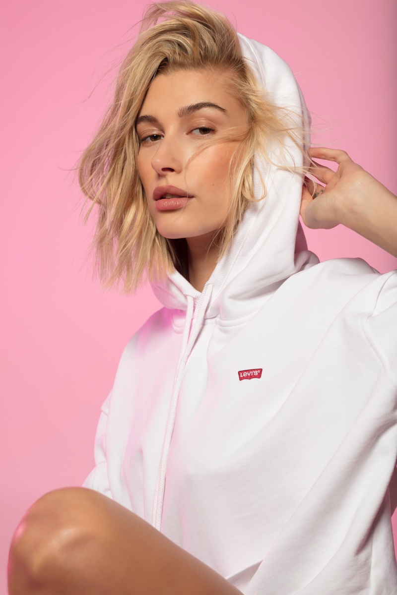 Model Hailey Baldwin wears hoodie from Levi's