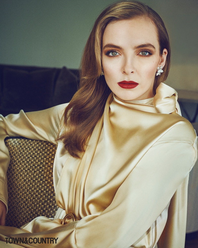 Actress Jodie Comer wears Bottega Veneta dress and Harry Winston earrings