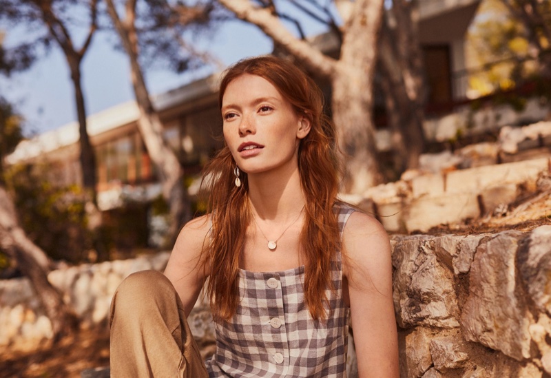 Julia Hafstrom wears Mango gingham print button top