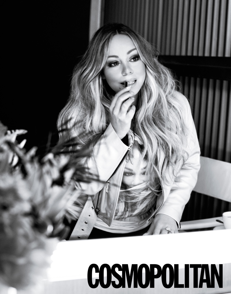 Primping for the mirror, Mariah Carey poses in Nour Hammour jacket, Mariah Carey Store T-shirt and Mother jeans