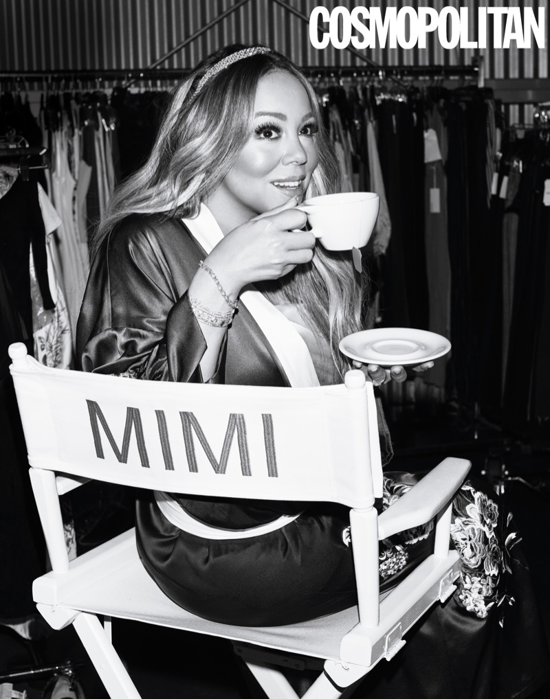 Singer Mariah Carey poses in Olivia von Halle robe, Fleur du Mal dress and Munnu/The Gem Palace headband