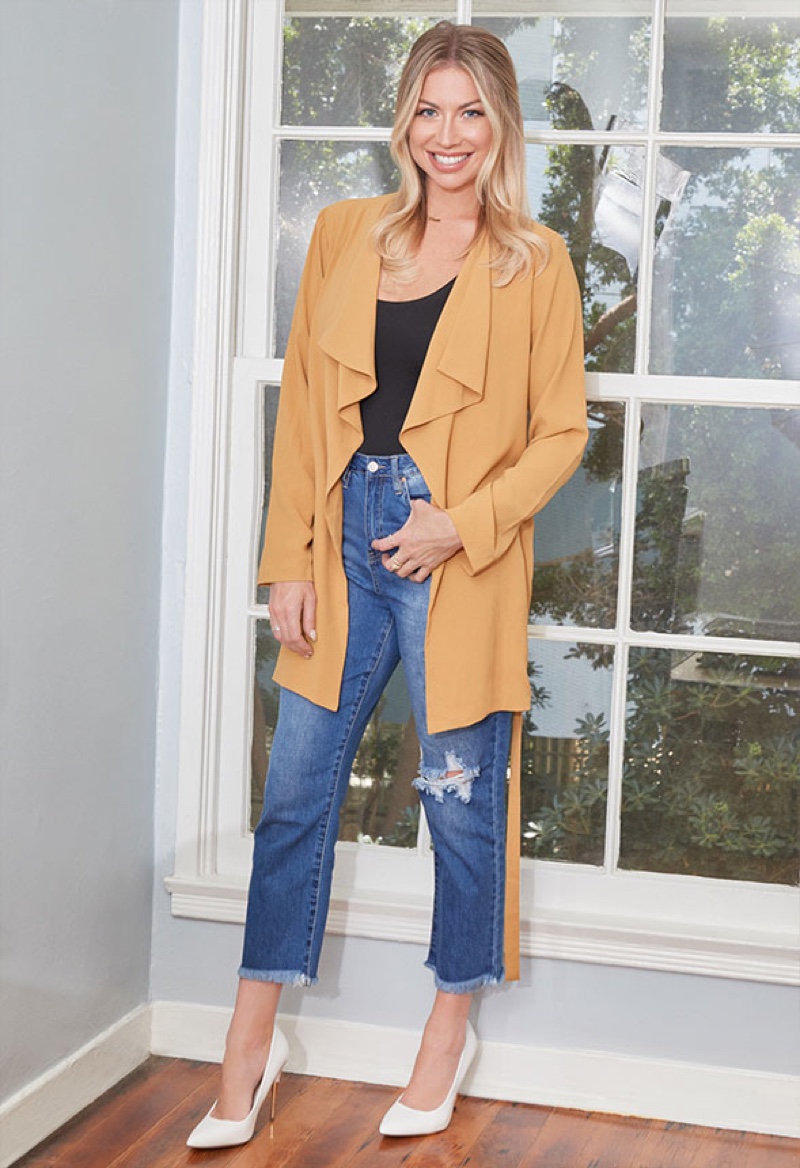 Vanderpump Rules star Stassi Schroeder wears drape front trench coat from JustFab collaboration