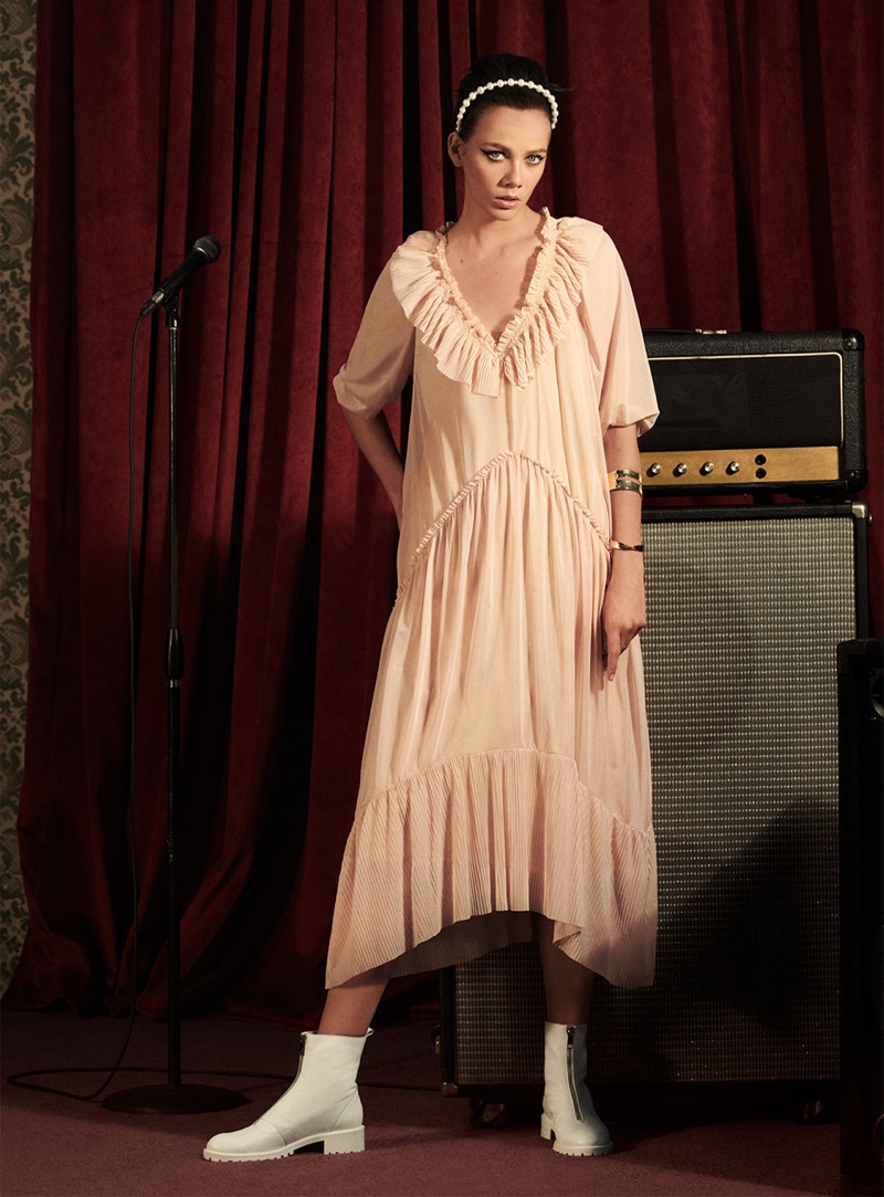 Model Marjan Jonkman wears Zara flowy dress, leather ankle boots with zipper and pearl headband