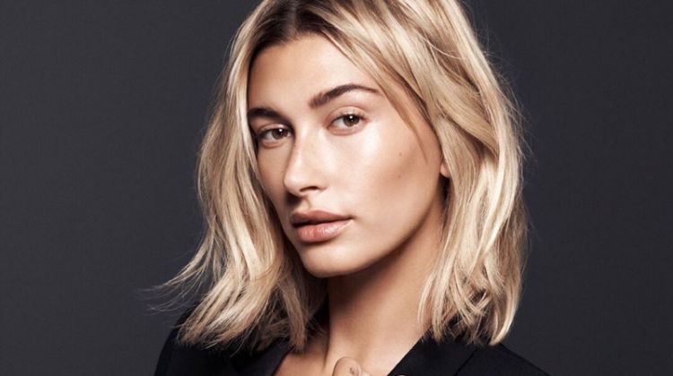 Model Hailey Baldwin appears in Daniel Wellington Iconic Link watch campaign