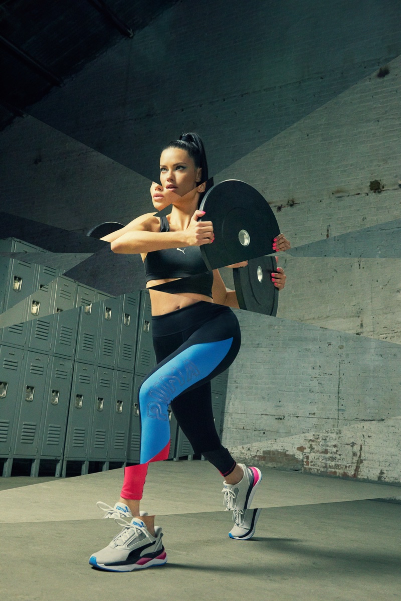 Adriana Lima does a lunge in PUMA LQD CELL Shatter XT Shift sneaker campaign