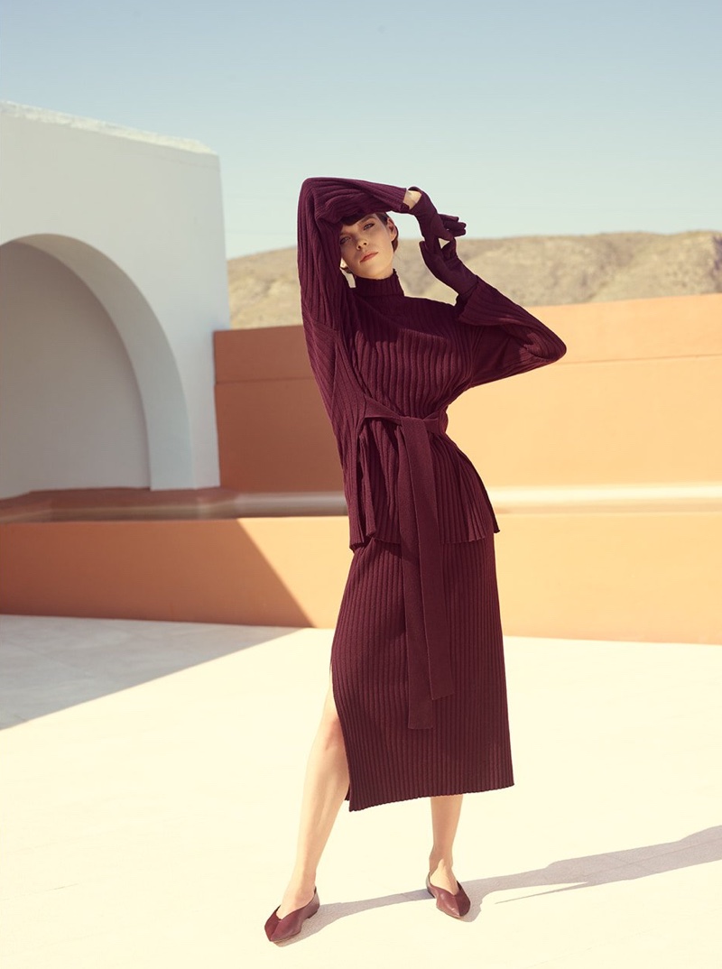 Model Meghan Collison poses in wool and cashmere top and skirt from Reserved Premium fall-winter 2019 collection