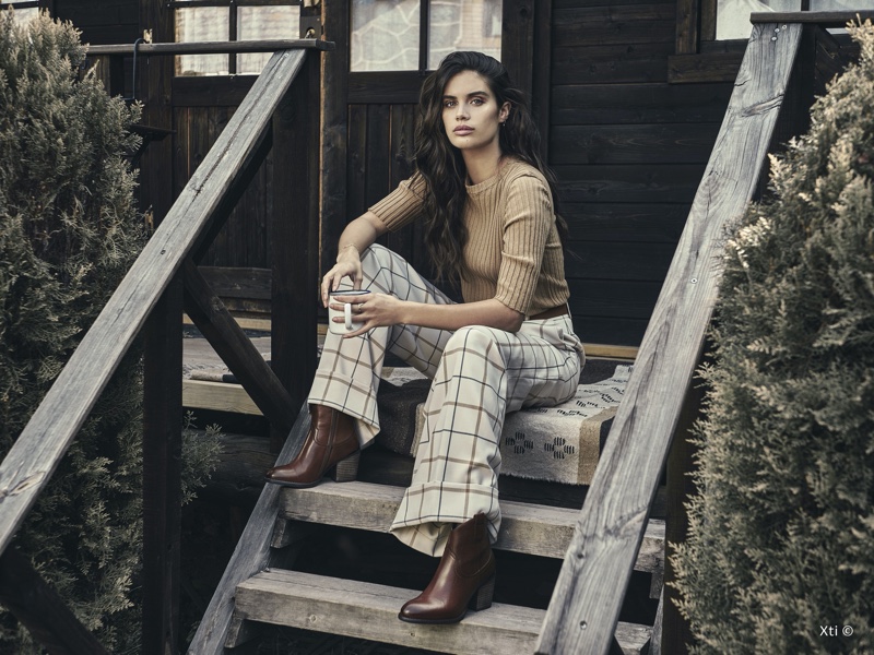 Model Sara Sampaio wears boots in XTI Shoes fall-winter 2019 campaign