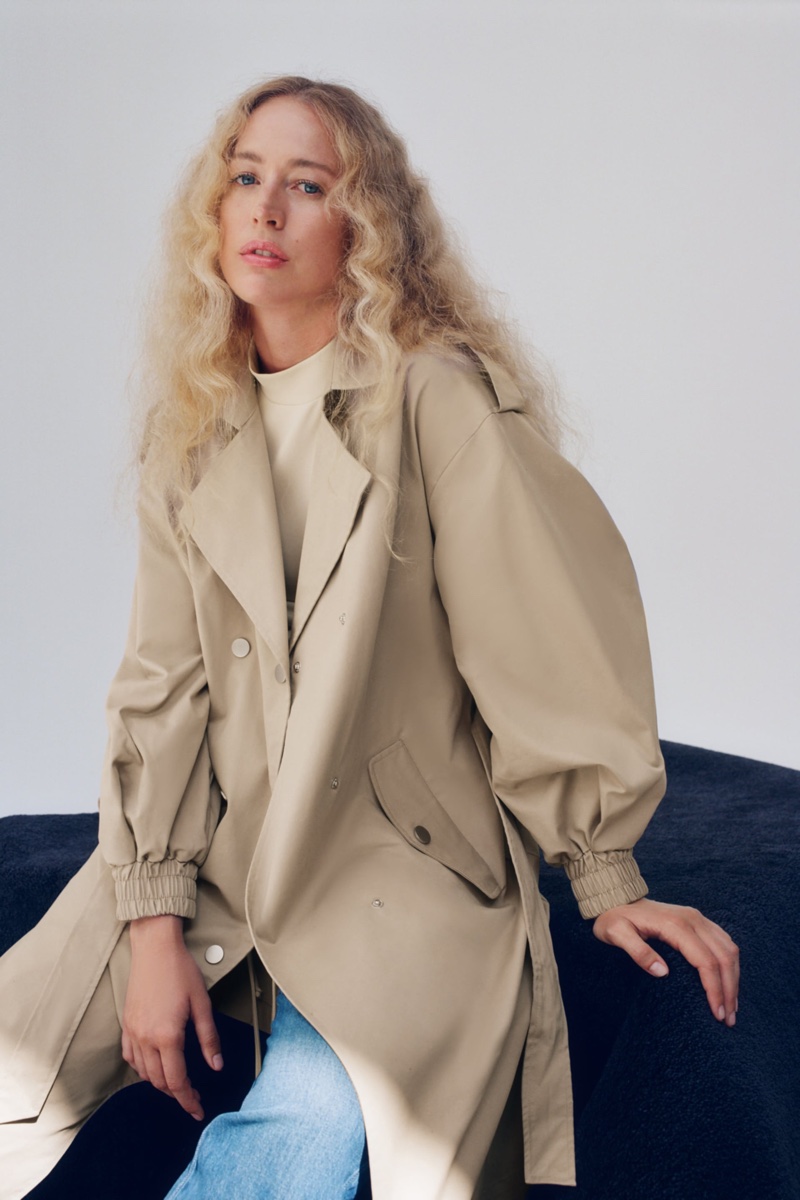 Raquel Zimmermann poses in Zara long trench coat with elasticized cuffs.