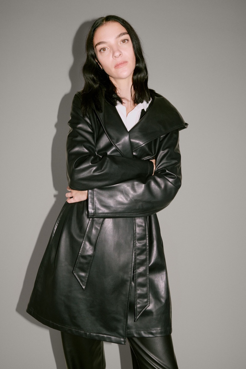 Mariacarla Boscono poses in Zara hooded faux leather coat.