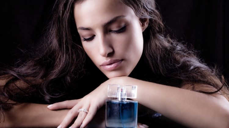 Model Dark Hair Perfume Bottle Blue