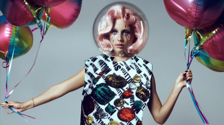 Posing with balloons, Emma Chamberlain wears Louis Vuitton x Fornasetti jacket. Photo: Domen & Van de Velde / Courtesy of V Magazine