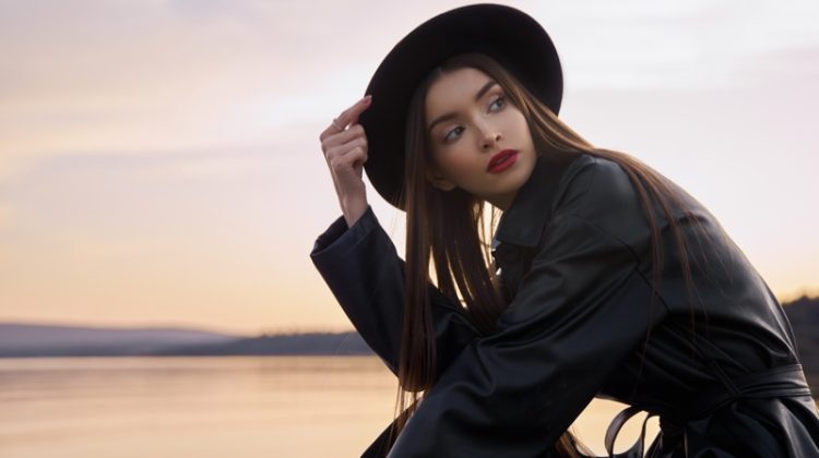 black leather coat hat outdoors red lip