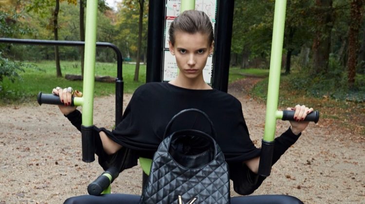 Luna Passos models Saint Laurent Icare Maxi shopping bag for winter/holiday 2022 collection.