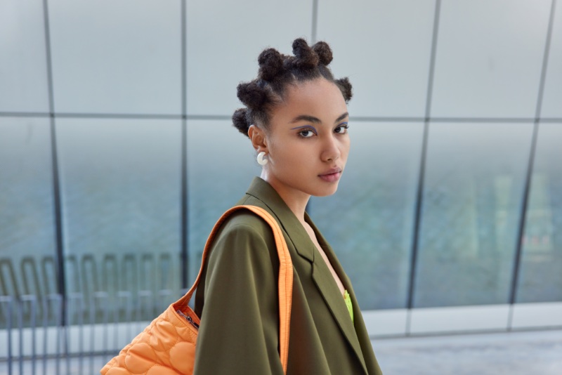 Woman Blue Eye Liner Bantu Knots