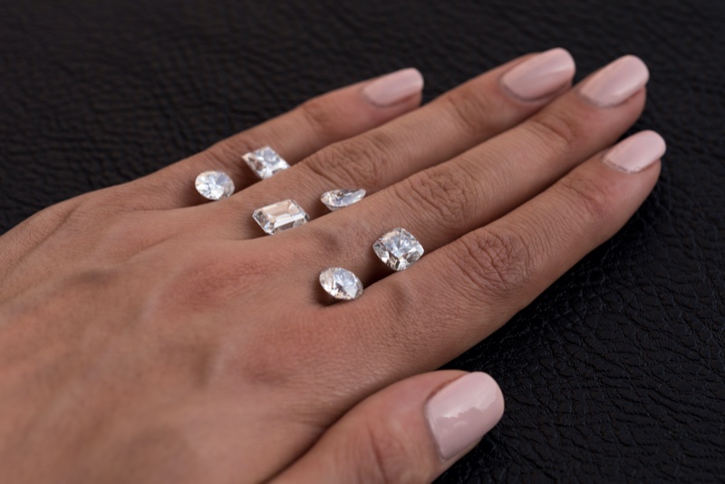 Woman Loose Diamonds Hands