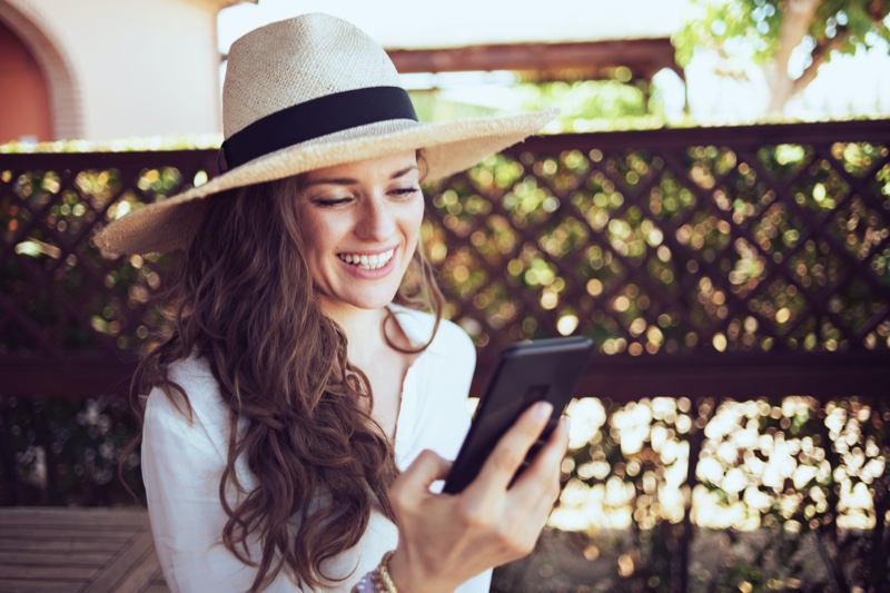 Woman Using Phone Happy