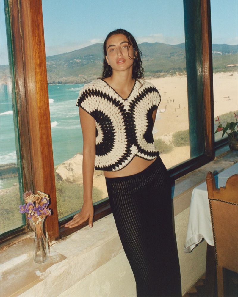 Massimo Dutti embraces monochrome with a crochet top and knit skirt with textured detail.