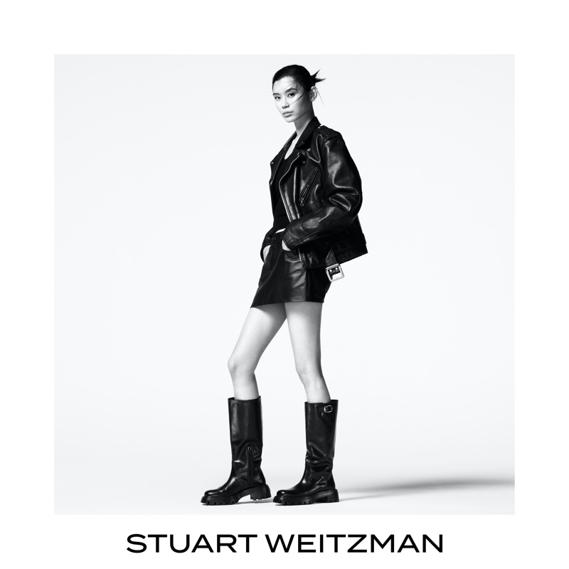 Ming Xi rocks leather boots for a new Stuart Weitzman campaign.