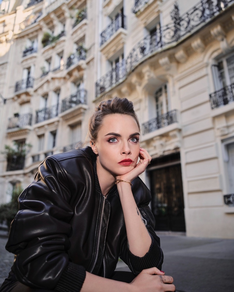 Cara Delevingne wears a glam makeup look for her L'Oreal Paris photoshoot.