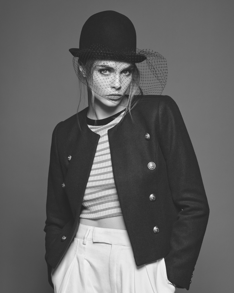 Photographed in black and white, Cara Delevingne poses for a L'Oreal Paris shoot.