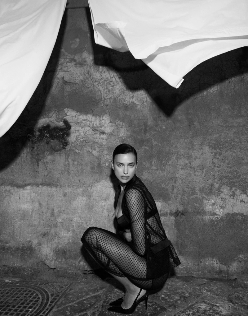 Irina Shayk strikes a pose for Dolce & Gabbana DNA, wearing a mesh ensemble.